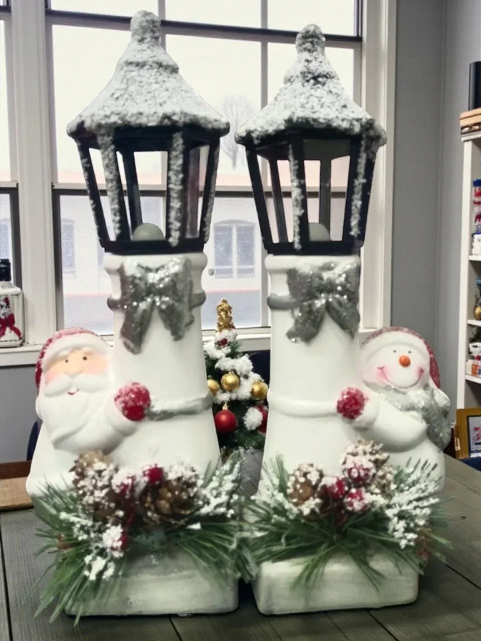 Snow Lantern Christmas Figurine Set | Santa & Snowman with Pinecones & Snowy Greens – Festive Table Décor Pack of 2