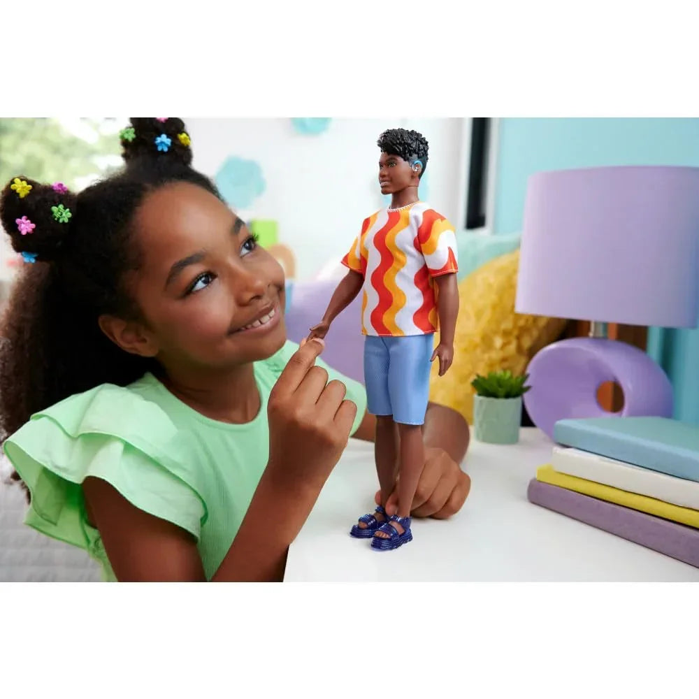 Barbie Fashionistas Ken Doll #220 with Behind-The-Ear Hearing Aids & Broad Body Wearing a Removable Orange Patterned Shirt, Shorts & Jelly Sandals - Jaiman Toys