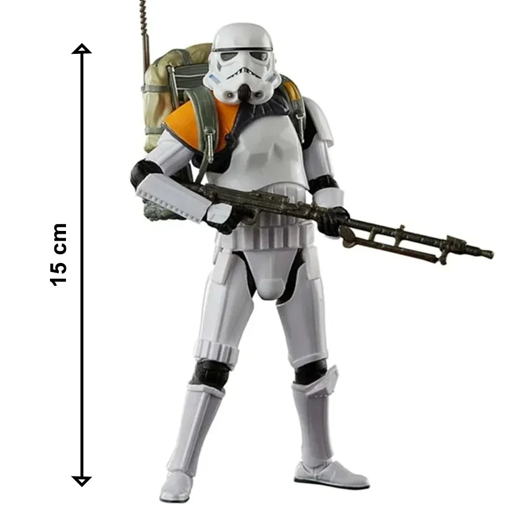 15 cm white and black action figure with helmet, orange shoulder pad, blaster rifle, and backpack