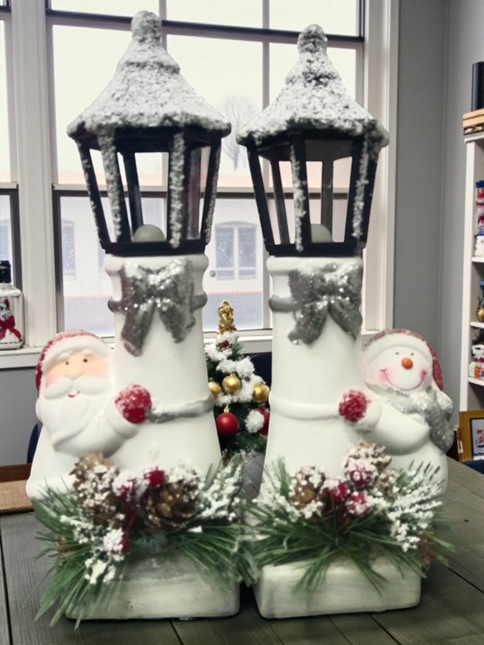 Snow Lantern Christmas Figurine Set | Santa & Snowman with Pinecones & Snowy Greens – Festive Table Décor Pack of 2