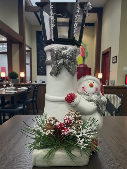Snow Lantern Christmas Figurine Set | Santa & Snowman with Pinecones & Snowy Greens – Festive Table Décor Pack of 2