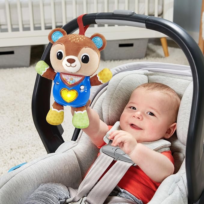 VTech Baby Cuddle and Sing Bear Stroller Crib Toy | Musical Plush Bear with Lights, Sounds & Sensory Activities