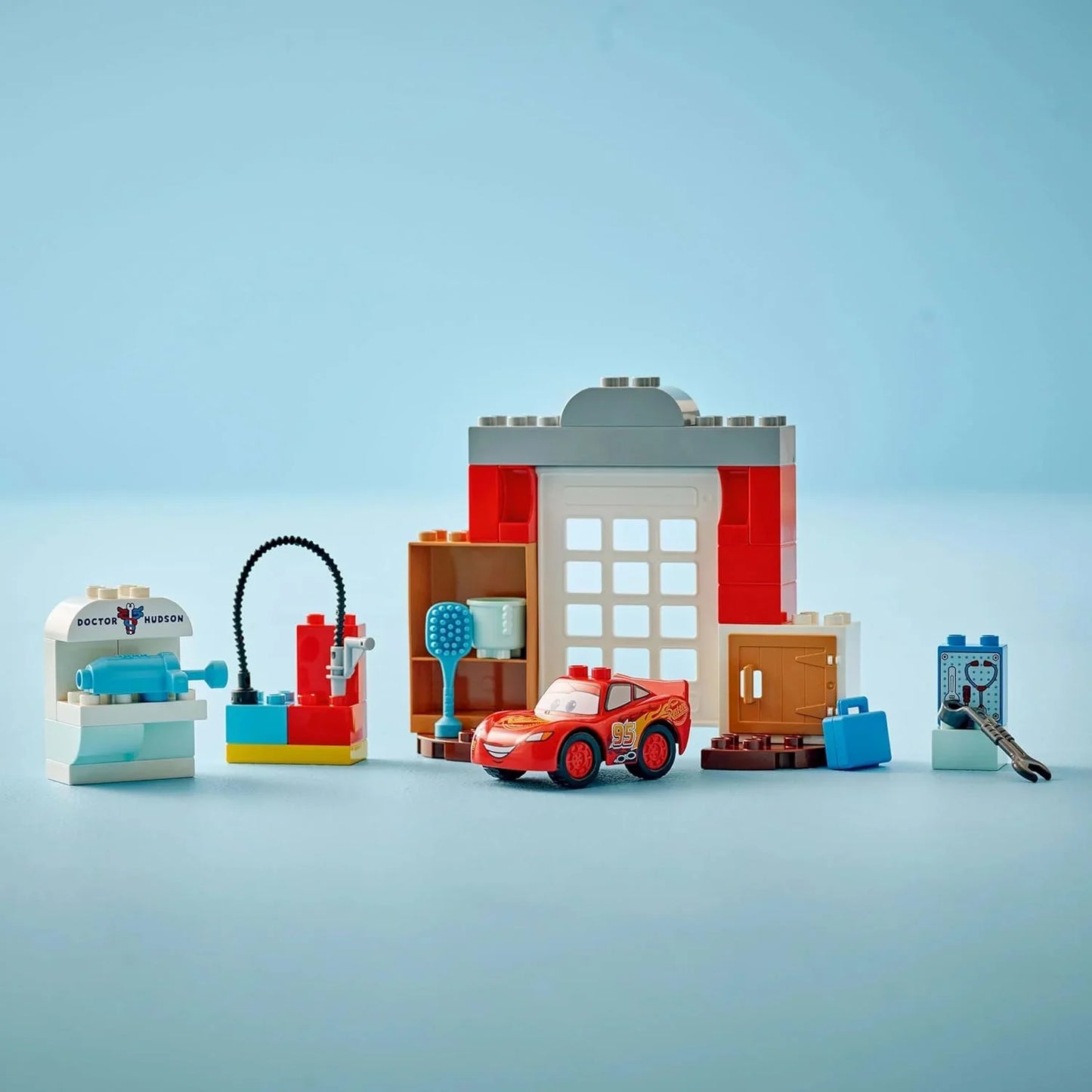 LEGO DUPLO 10456 Disney and Pixar McQueen's Visit to Doc's Garage - incl. a Race Car Toy for Toddlers, Car Wash Tools & Accessories - Gift for 2+ Year Old Boys & Girls