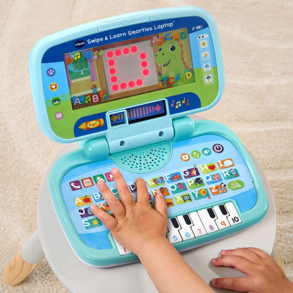 VTech Swipe and Learn Smarties Laptop | Interactive Educational Learning Laptop with ABC Keyboard, Piano Keys, Games & Music for Toddlers, Blue