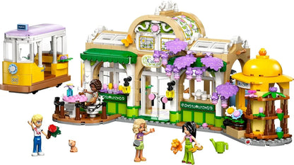 LEGO Friends 42671 Plant Café & Flower Shop Toy - Building Set with 4 Mini Dolls, a Cat Figure, a Tram and Kitchen Accessories incl. Pastries, Cups & a Teapot - Birthday Gift for 9+ Year Old Girls