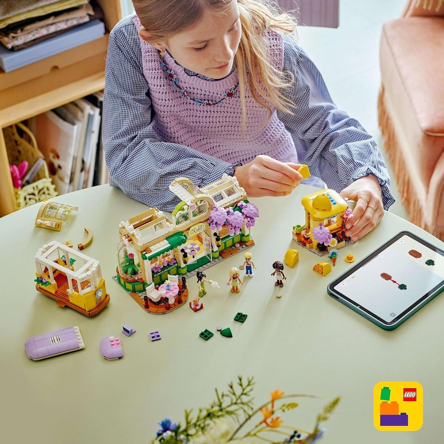 LEGO Friends 42671 Plant Café & Flower Shop Toy - Building Set with 4 Mini Dolls, a Cat Figure, a Tram and Kitchen Accessories incl. Pastries, Cups & a Teapot - Birthday Gift for 9+ Year Old Girls