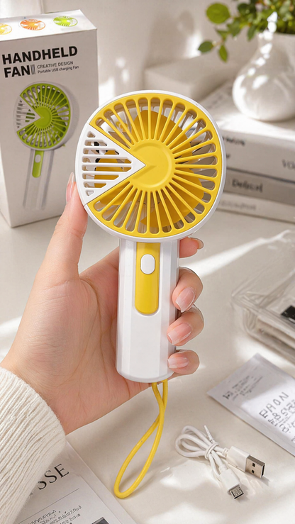 Portable Handheld Mini Fan – Lightweight Personal Cooling Fan with Wrist Strap for Travel, Office & Outdoor Use (Pack of 1)