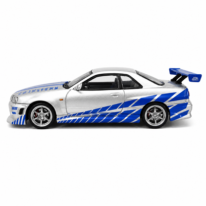 Time Micro 1:64 Nissan Skyline GT-R R34 C-West Silver & Blue Die-Cast Model Car | JDM Japanese Racing Sports Car Miniature | Detailed Collectible Scale Model with Racing Livery Display Box | Premium Nissan R34 Diecast Car for Collectors & Display