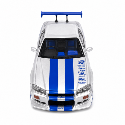 Time Micro 1:64 Nissan Skyline GT-R R34 C-West Silver & Blue Die-Cast Model Car | JDM Japanese Racing Sports Car Miniature | Detailed Collectible Scale Model with Racing Livery Display Box | Premium Nissan R34 Diecast Car for Collectors & Display