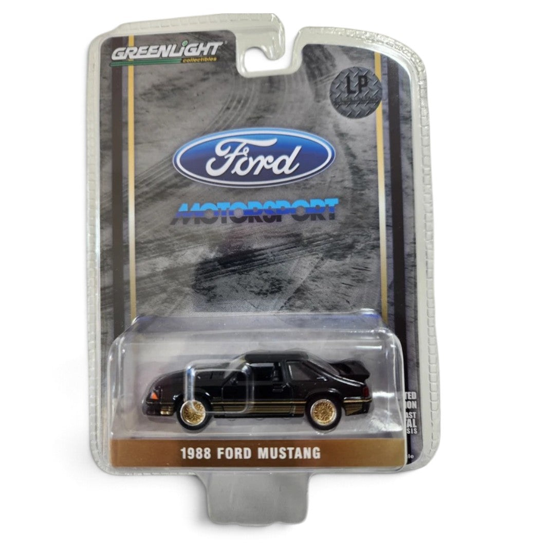 GreenLight 1:64 Scale  1988 Ford Mustang Fox Body SLN – Black & Gold, LP Diecast Garage Exclusive