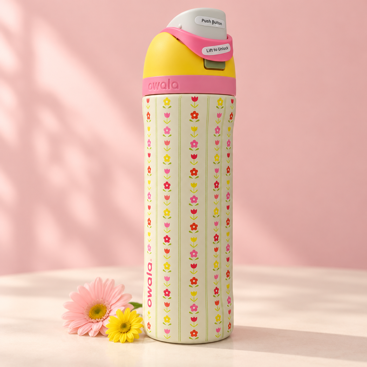 Owala 710ml FreeSip Insulated Water Bottle with Straw & Push-Button Lid – Cream Floral Print with Pink and Yellow Lid