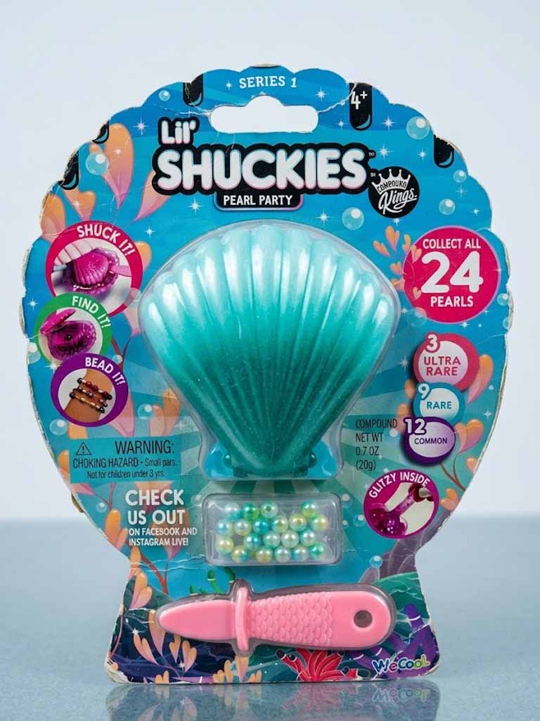 (Creased Pack) Lil Shuckies Pearl Party Surprise Shell Playset – Collectible Pearl Discovery Toy with Bracelet Making Activity