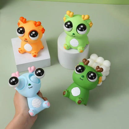 Squishy Dinosaur with Pop-Out Eyes Funny Dragon Pinch Toy 4 Pieces - Jaiman Toys