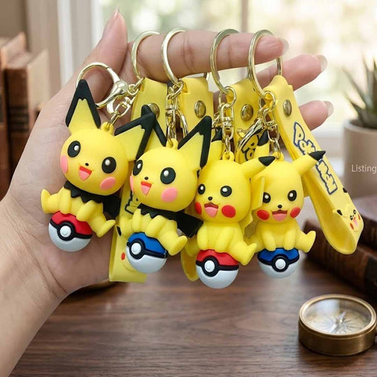 Pikachu Style Character Keychain with Pokeball Charm – Cute Anime Monster PVC Keyring for Bags & Keys ( 1 Assorted Random Design Keychain)